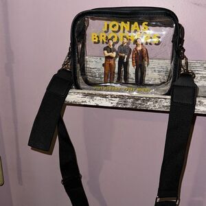 Jonas Brothers five albums every night clear Crossbody wristlet